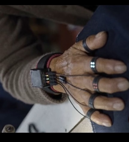 Sensor equipment attached to a human hand during a motion-capture experiment
